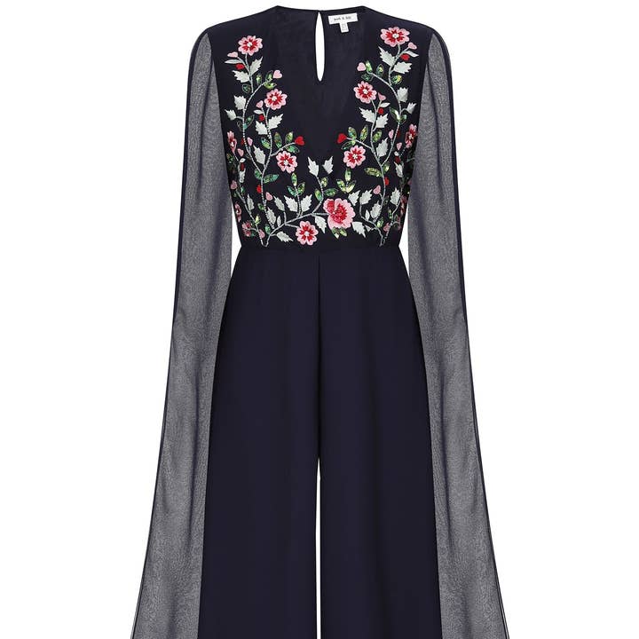 Combinaison à manches cape à broderies florales Rue Navy pour la vente par Frock & Frill