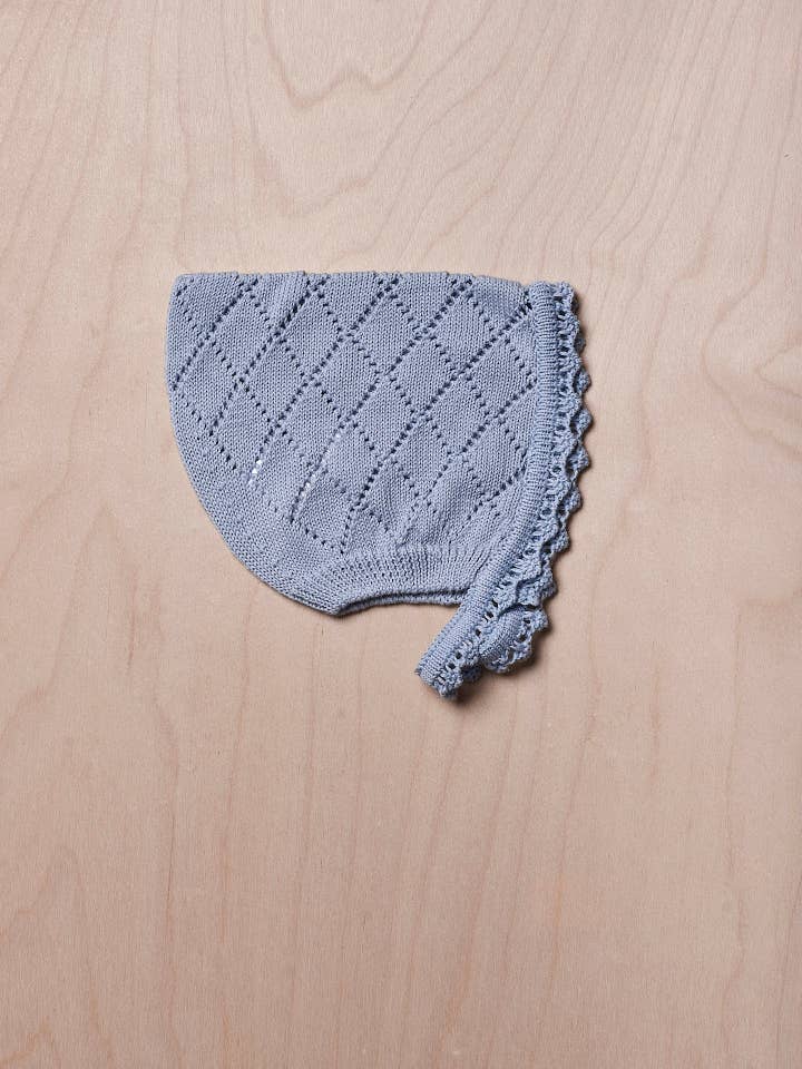 Bonnet knitted in organic cotton | PURE for wholesale by Wedoble: sustainable children's fashion