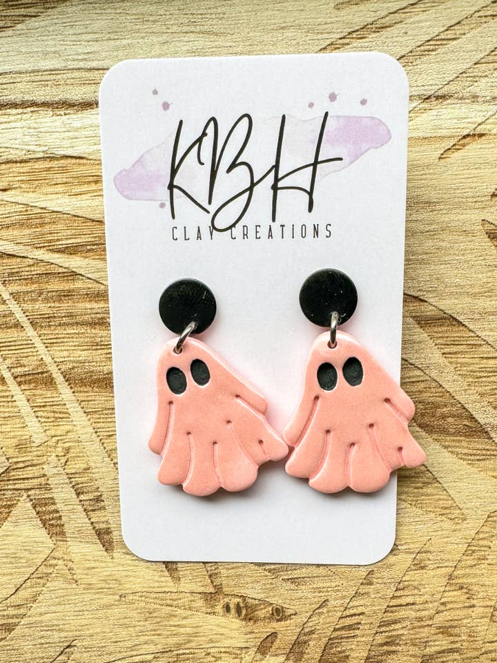 Boucles d'oreilles pendantes en argile Orange Ghost pour la vente par KBH CREATIONS