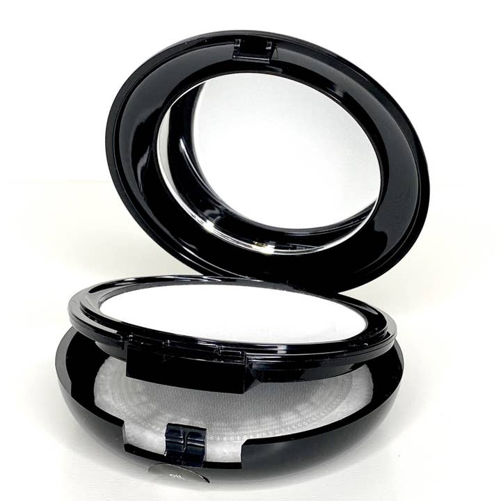 INVISIBLE OIL CONTROL PRESSED POWDER BI-LEVEL COMPACT WITH PUFF 10G. .35 OZ for wholesale by Sydoni Skincare and Beauty, Inc.