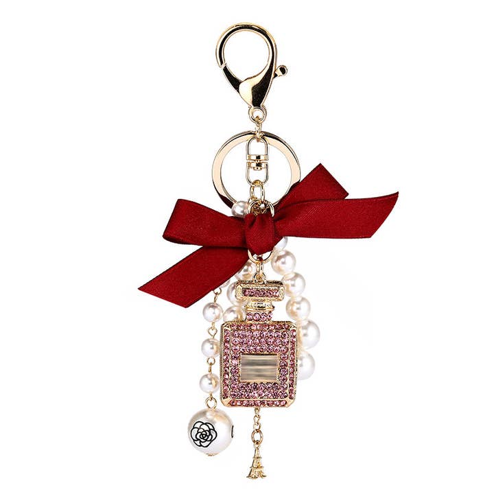 MKS America - Wholesale Keychain - Women's - Perfume Bottle Bow Pearl Bag Charm Keychain
