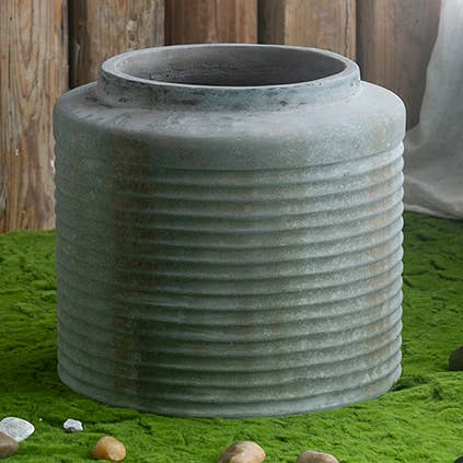D18.5X17" Green Gray Cement Corrugated Planter and other Purchase Wholesale grey pebbles. Free Returns & Net 60 Terms on Faire trending on Faire.