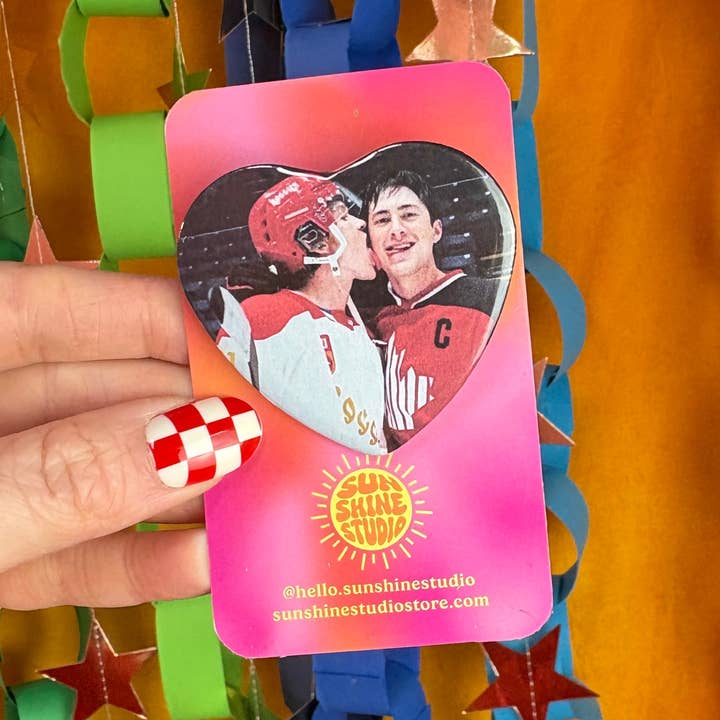 Ilya and Shane Tongue Heated Rivalry Pin for wholesale by Sunshine Studio