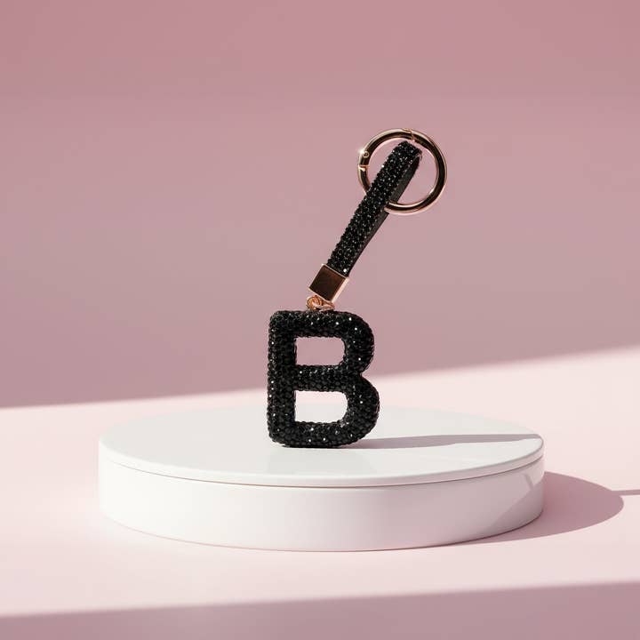 Nero Portachiavi e Ciondolo per Borsa con Lettera Iniziale in Cristallo Nero in vendita all'ingrosso su Faire6