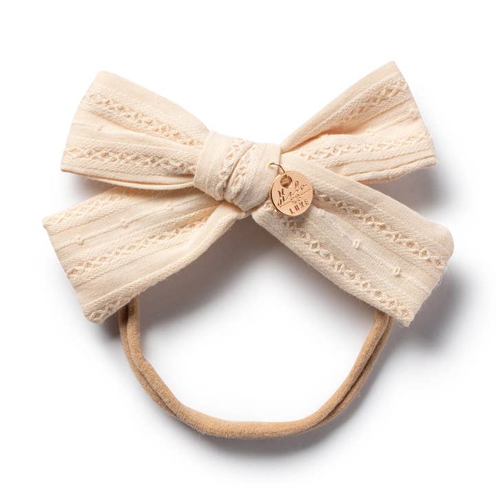 Fascia bimbo Forever eylet crema per la vendita all'ingrosso da parte di Halo Luxe