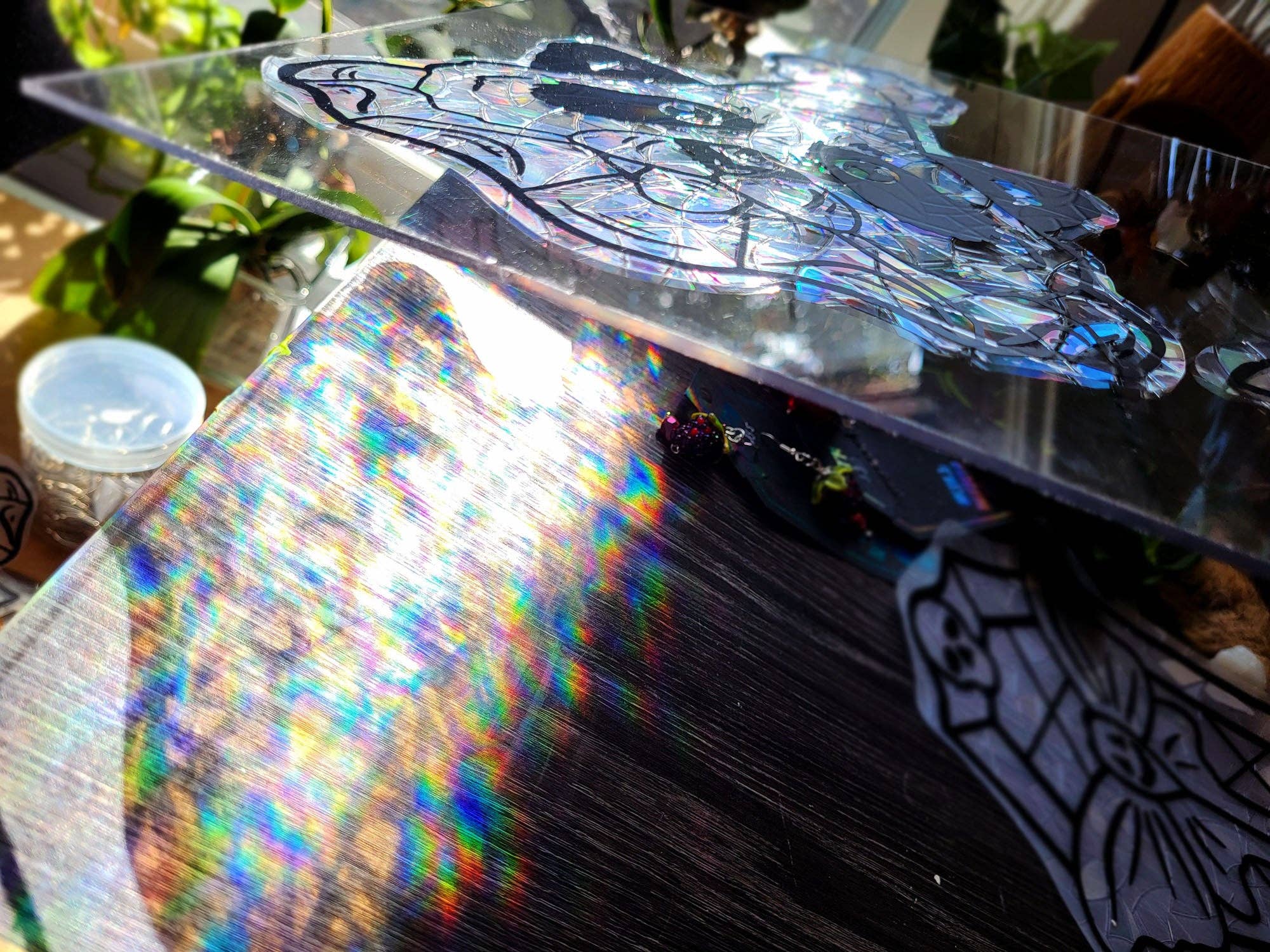 Tia Kinsman - Wholesale Suncatcher - Party Raccoon Rainbow Window Cling2