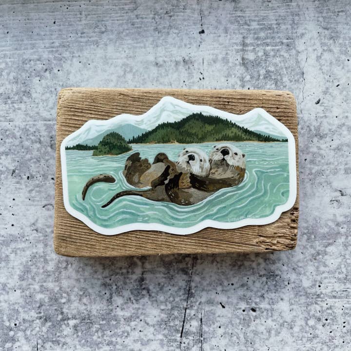 Island Otters Sticker for wholesale by Canyon & Cove Art