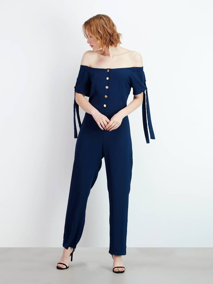Gold Button Jumpsuit for wholesale by GUIMANOS