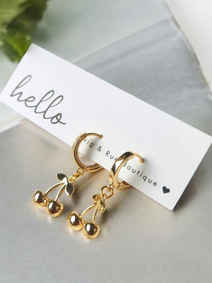 Huggie hoops with Gold Cherries for wholesale by Twig & Rue boutique