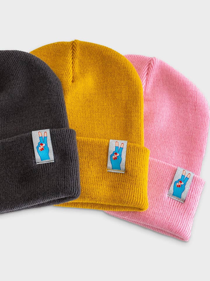 Bonnet « Peace » avec étiquette argentée scintillante pour la vente par Power Sprotte
