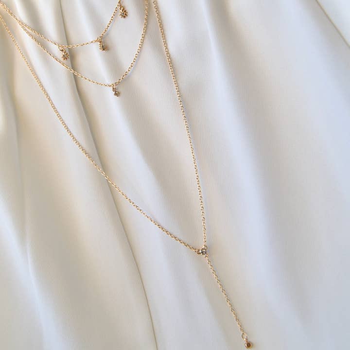 Gold-Tone Layered Star & Y‑Drop Pendant Necklace for wholesale by EAST INDIA IMPORTS