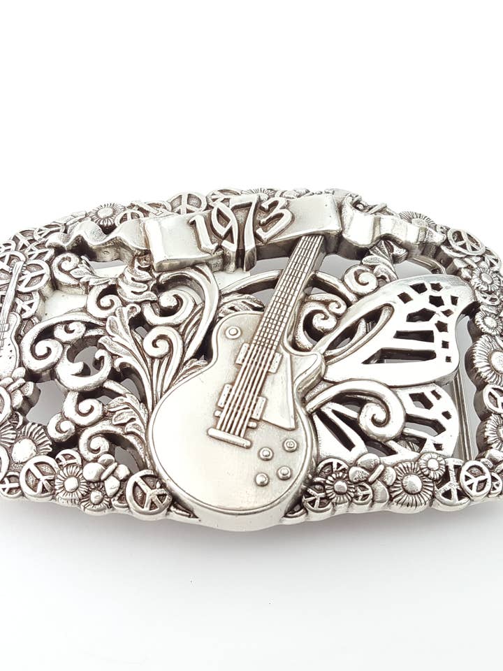 Fibbia: fibbia per cintura per chitarra, farfalla, Peace e Daisy per la vendita all'ingrosso da parte di Axesoria West