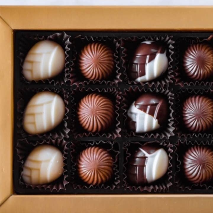 Assorted Artisan Chocolate Gift Box – Gold Box of 12 for wholesale by CORRY’S ARTISAN CHOCOLATES