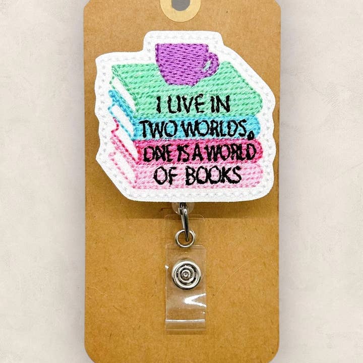 I Live in Two Worlds, One is a World of Books Badge Reel for wholesale by The SmallTownSunshine Company
