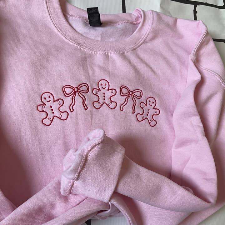 Gingerbread and Bows Sweatshirt | Light pink with red thread for wholesale by Lem&Lollipops Supply Co. LLC