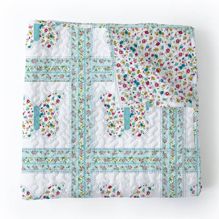 Couverture pour bébé patchwork papillon turquoise pour la vente par Ida Mae Home