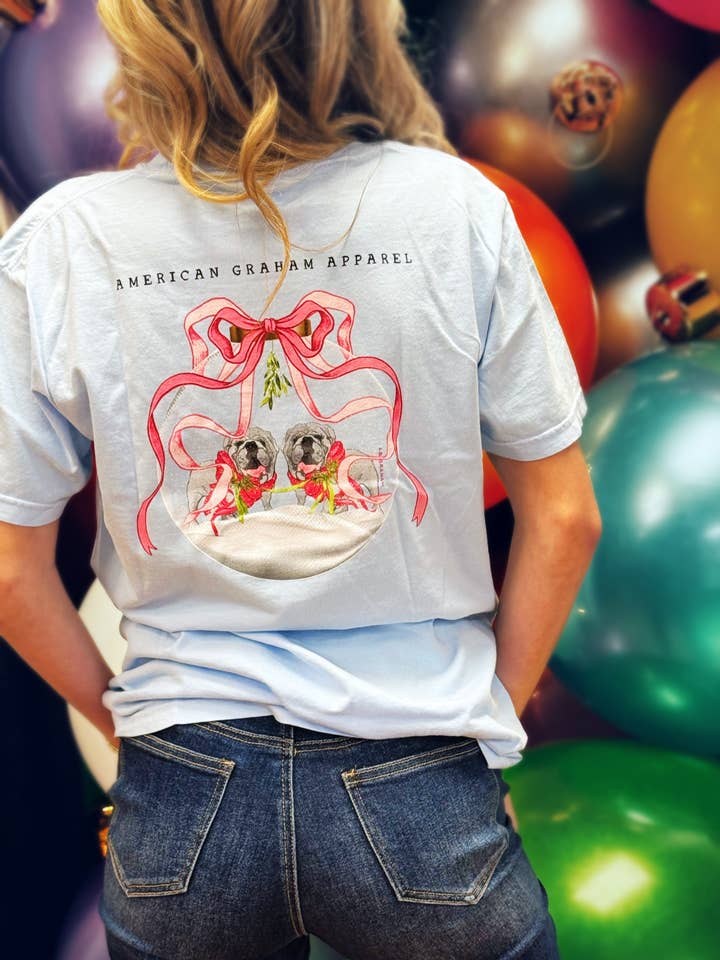 Meet Me Under The Mistletoe Christmas Comfort Colors T-Shirt for wholesale by American Graham Apparel