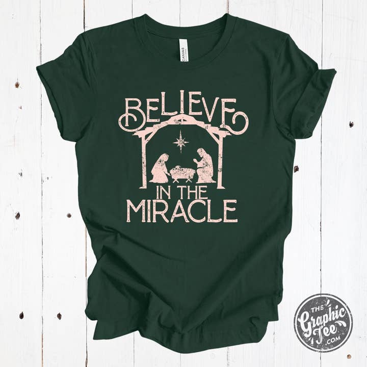 *WHOLESALE* Believe In The Miracle Forest Green Short Sleeve Tee for wholesale by The Graphic Tee