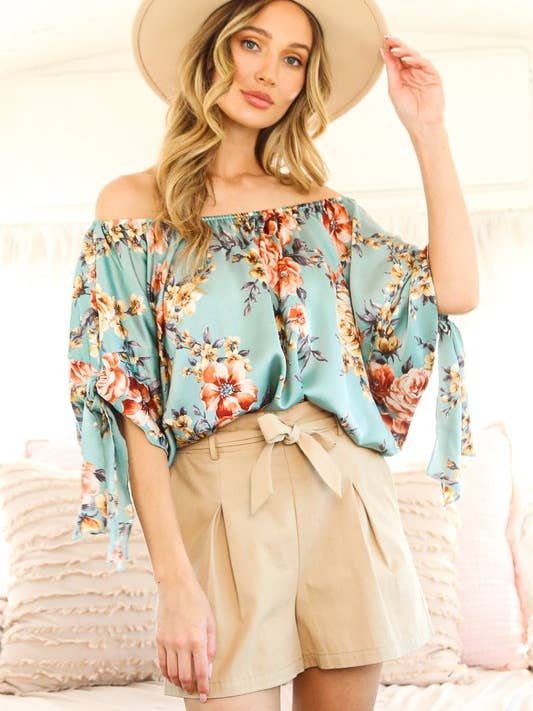 MANGA DOLMAN COM DETALHE DE GRAVATA TOP ESTAMPADO FLORAL por atacado de Pink Irene Wholesale