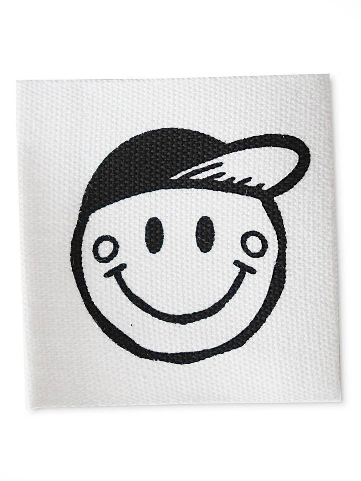 Cotton label *Smile Cap* for wholesale by Paul und Clara