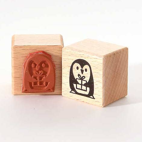 Timbro: pinguino con regalo per la vendita all'ingrosso da parte di Heindesign