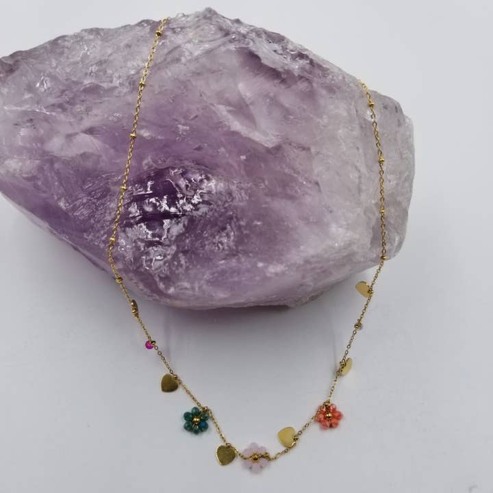 Gold Plated Flower & Hearts Charm Necklace for wholesale by magnolia jewelry