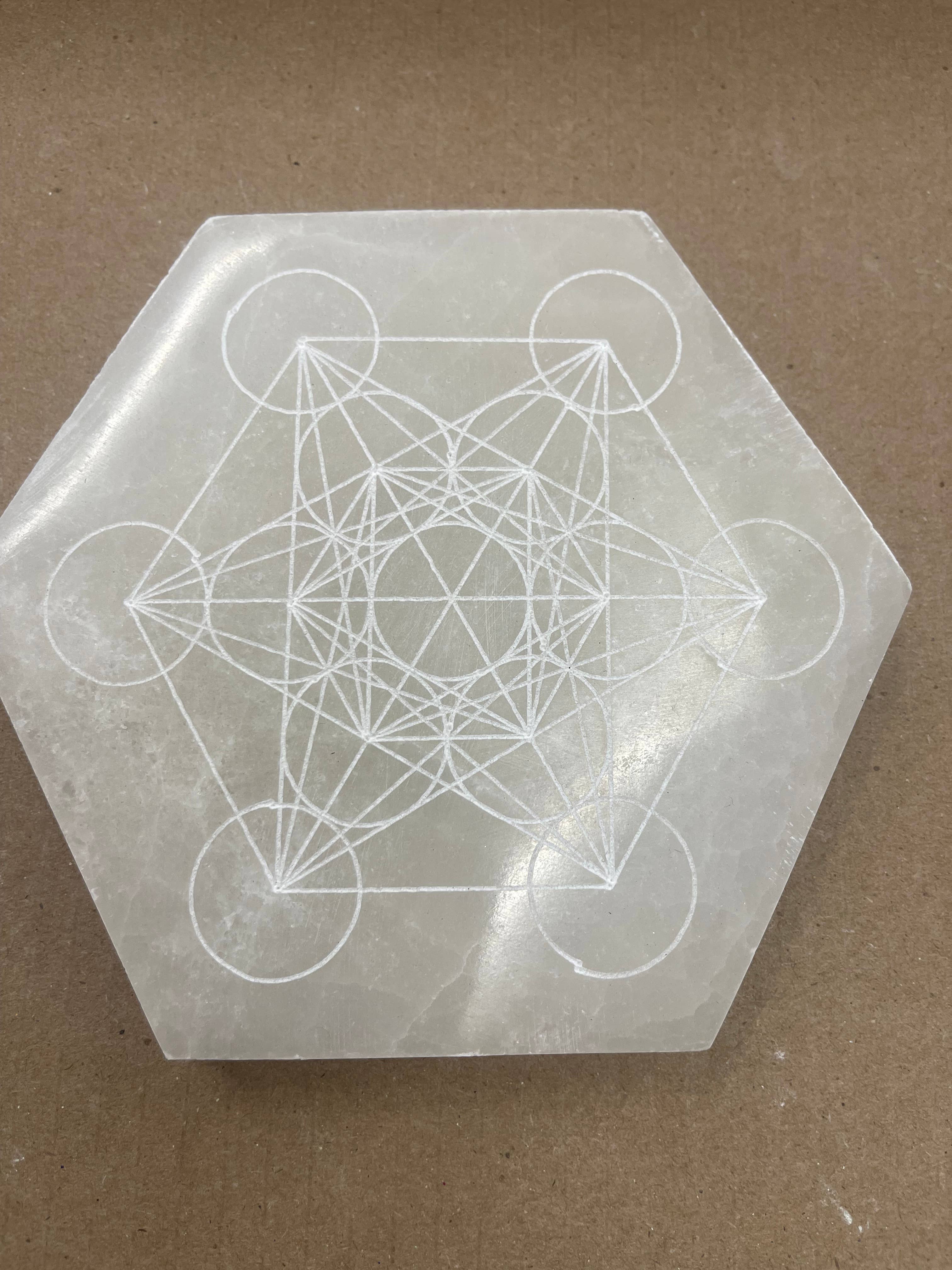Casablanca Exports – wholesale Crystal-charging plate – 14cm Selenite Hexagon Charging Plate  Etched Sacred Geometry1