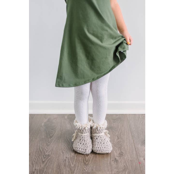 Mysiga fårskinnstofflor för baby. Fårskinnstofflor och babytossor för wholesale av I’m in the Loop