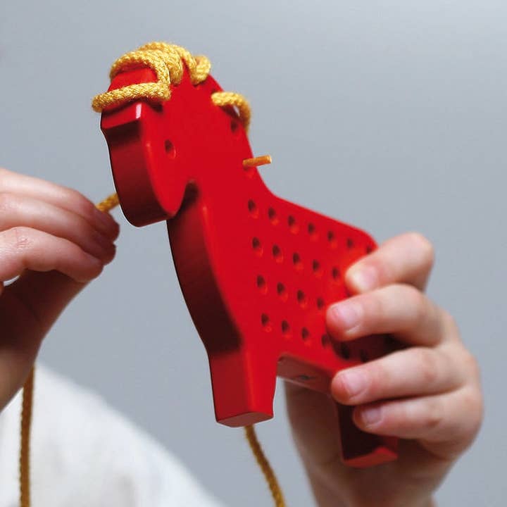 Schnurpfel-Pony red for wholesale by Naef USA