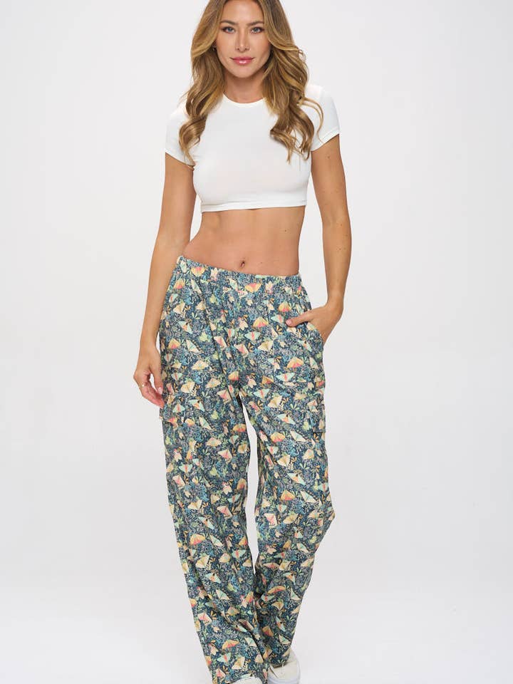 PANTALONES DE PANA CON ESTAMPADO FLORAL DE POLILLA para venta al por mayor de SM WARDROBE