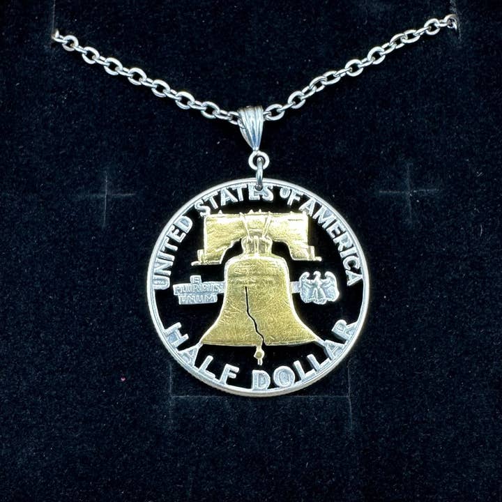 U.S. Cracked Liberty Bell Silver Half Dollar Hand Cut Coin Necklace for wholesale by Mountainstruck Coin Rings and Jewelry