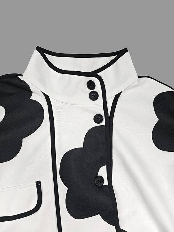 PRETO BRANCO Casaco de gola alta com manga longa, corte solto, estampa floral em cores contrastantes e abertura lateral para venda a revendedores na Faire12