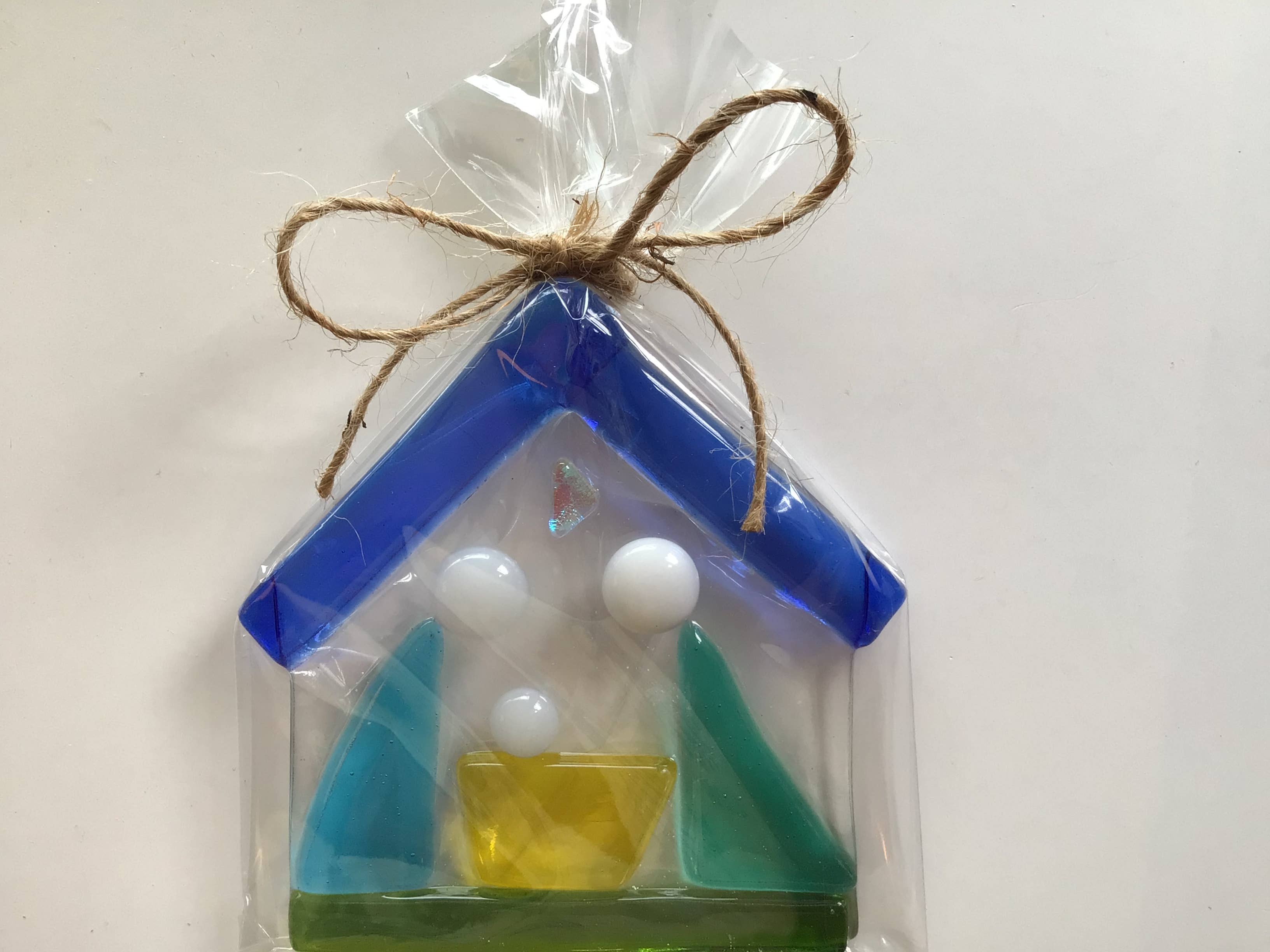 olika nyanser av blues gröna teals på klar bakgrund Födelsekyrkan ornament för wholesale på Faire7