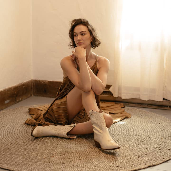 ivoor Onstuitbare westerse cowboylaars van ivoorkleurig leer voor dames voor groothandel op Faire1