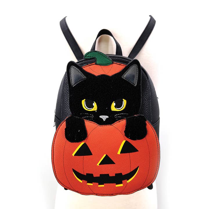 Mini-sac à dos en forme de chat noir poilu dans une citrouille pour la vente par COMECO INC