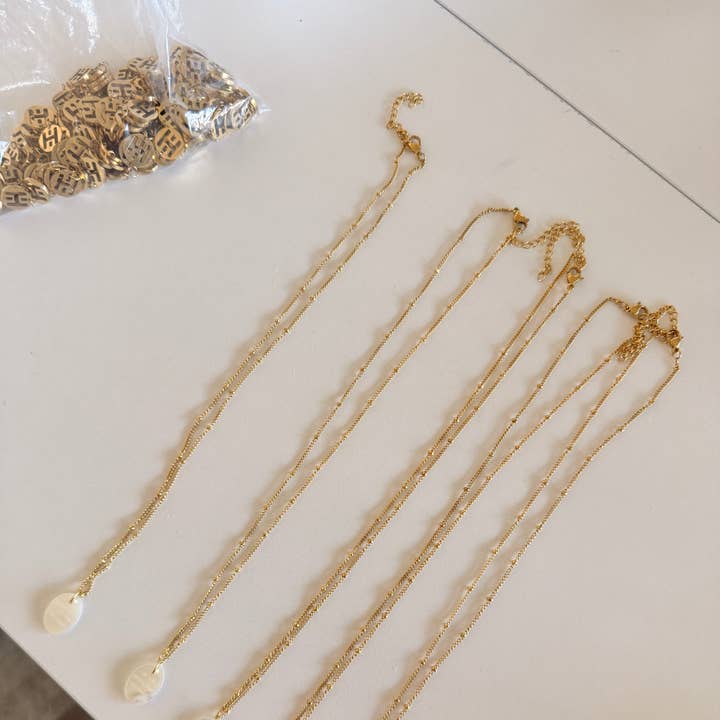 Mutterperl-Mantra-Halskette für den Großhandel von Hoo Hoops