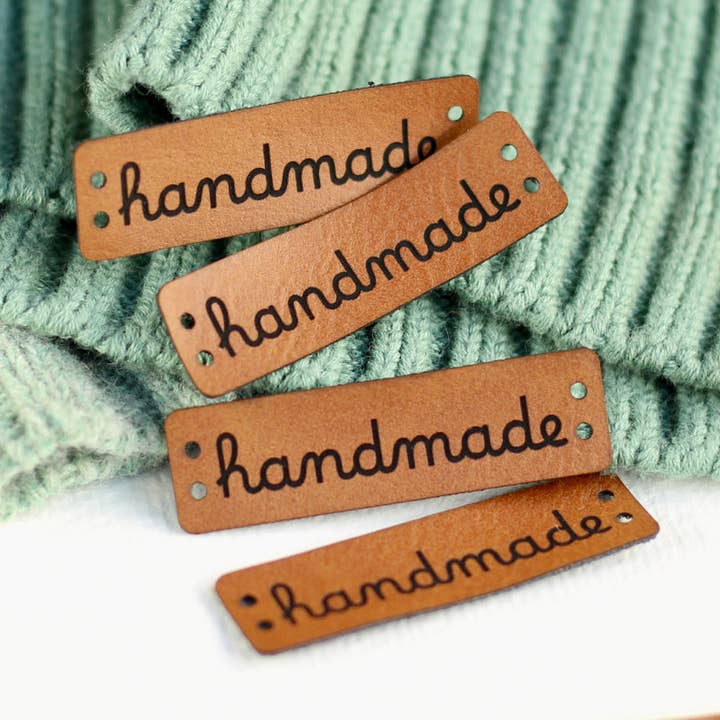 "Handgjorda" konstläderetiketter för wholesale av Cutpie