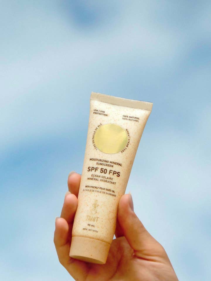 Écran solaire minéral hydratant SPF50 / Noix de coco + Vanille pour la vente par TANIT