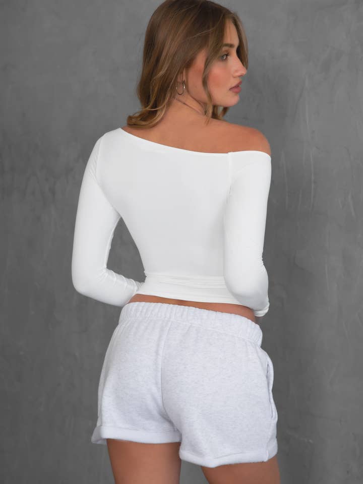 White AUDREE One-Shoulder Assymetrical Neckline Long-Sleeve Top for wholesale on Faire2