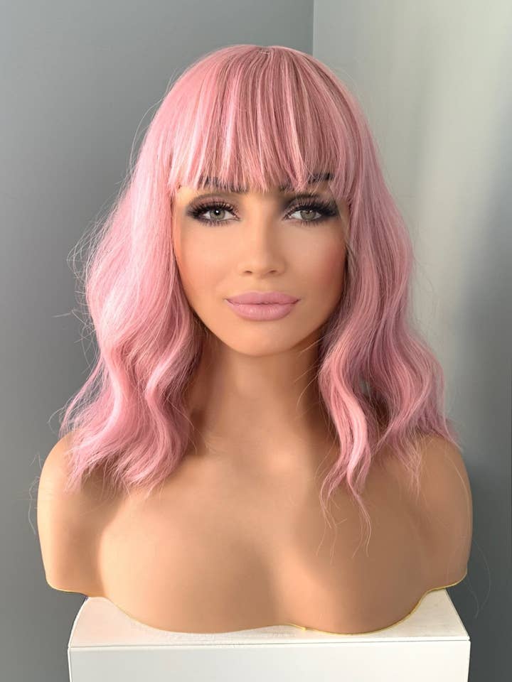 "Elle" - Short Baby Pink Wig with Bangs for wholesale by The Extension Room