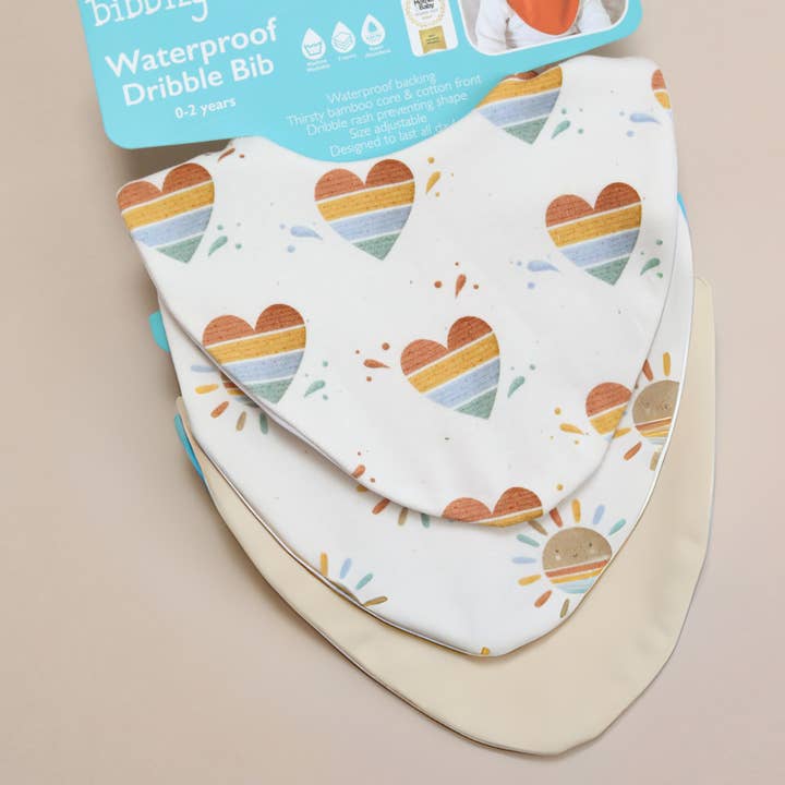 Sunshine & Rainbows Bundle of 3 Waterproof Dribble Bibs for wholesale by Bibbilyboo