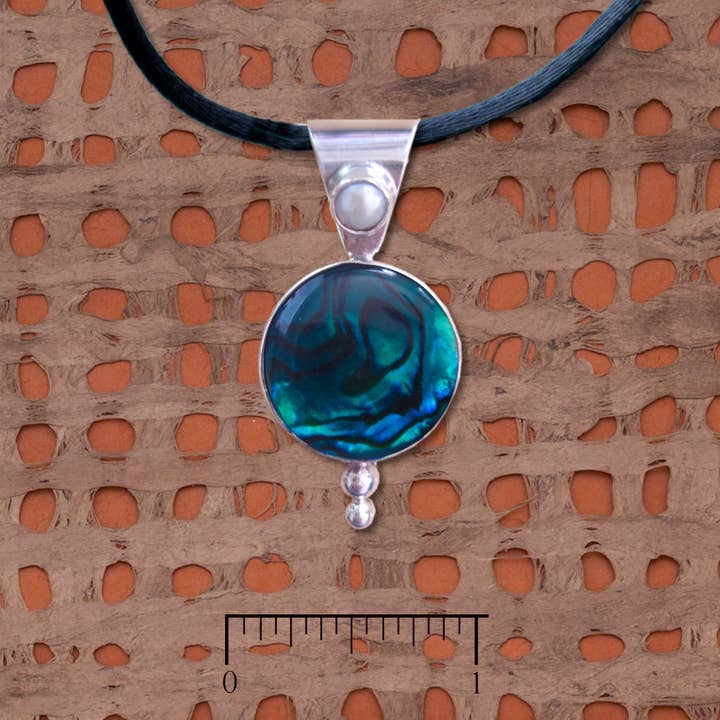 Paua shell and pearl sterling silver pendant for wholesale by Tidepool