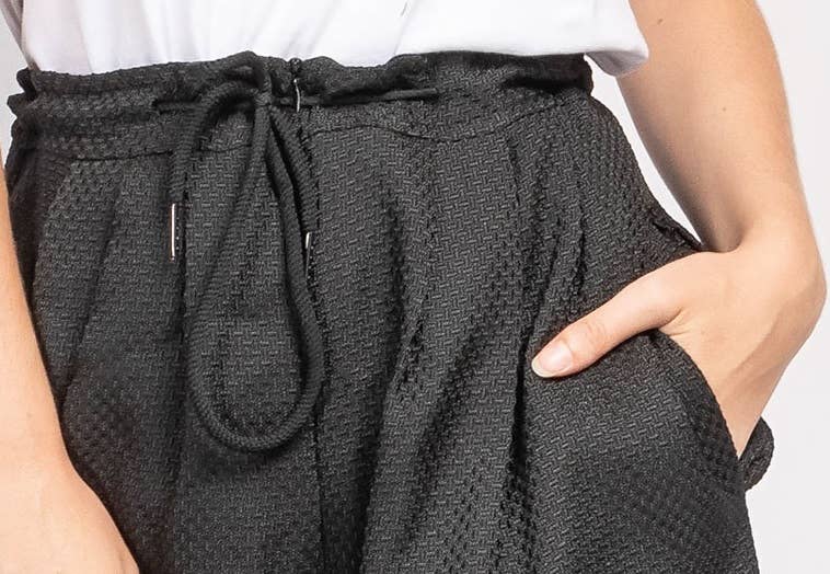 Black pleated textured trousers - S21 for wholesale on Faire1