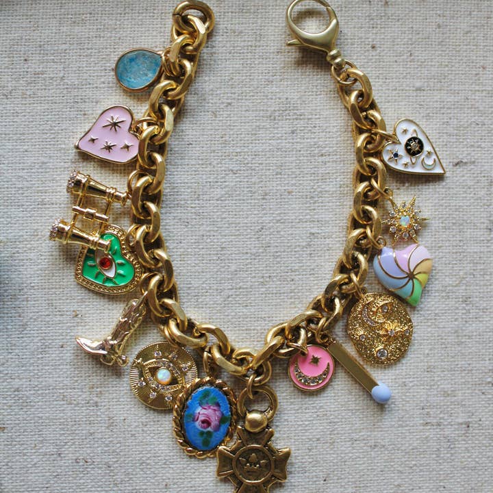 Antiqued Gold Charm Bracelet for wholesale on Faire
