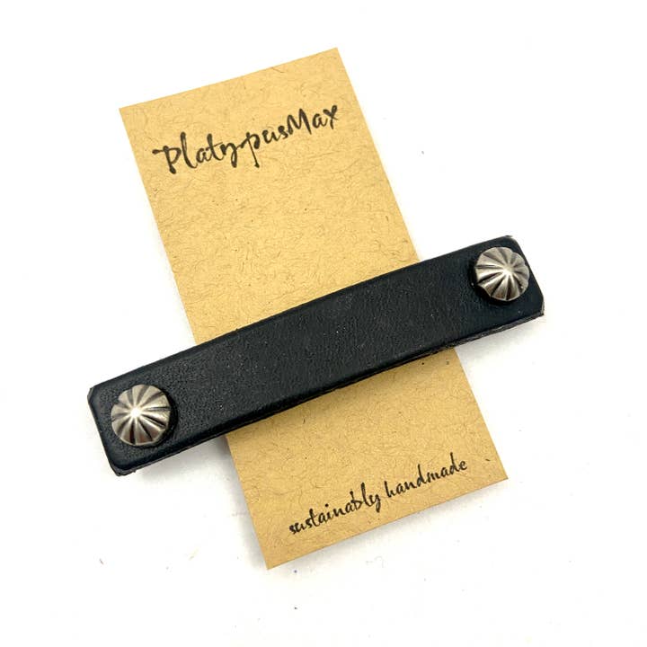 Clip de pelo de cuero negro con tachuelas plateadas decorativas para venta al por mayor de PlatypusMax