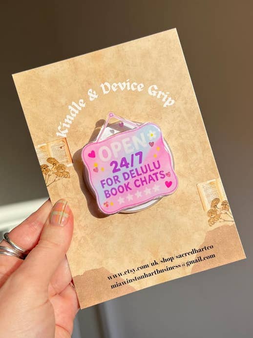 Open 24/7 for delulu book chats, kindle holder, phone holder, cowboy romance booktok gift, book girlie romance book kindle accessory for wholesale by Sacred Hart Co