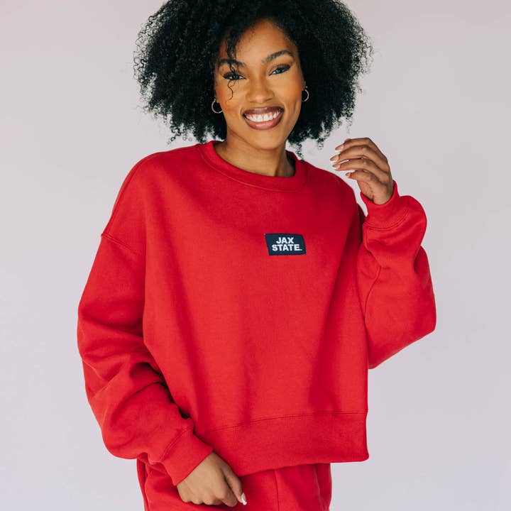 The Becca Crewneck Red | Jax State Woven Label and other Purchase Wholesale emaille becher. Free Returns & Net 60 Terms on Faire trending on Faire.