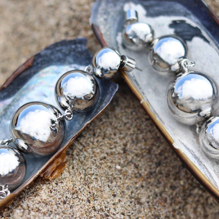 Solar Drop Earrings in Silver for wholesale by Elizabeth Laine