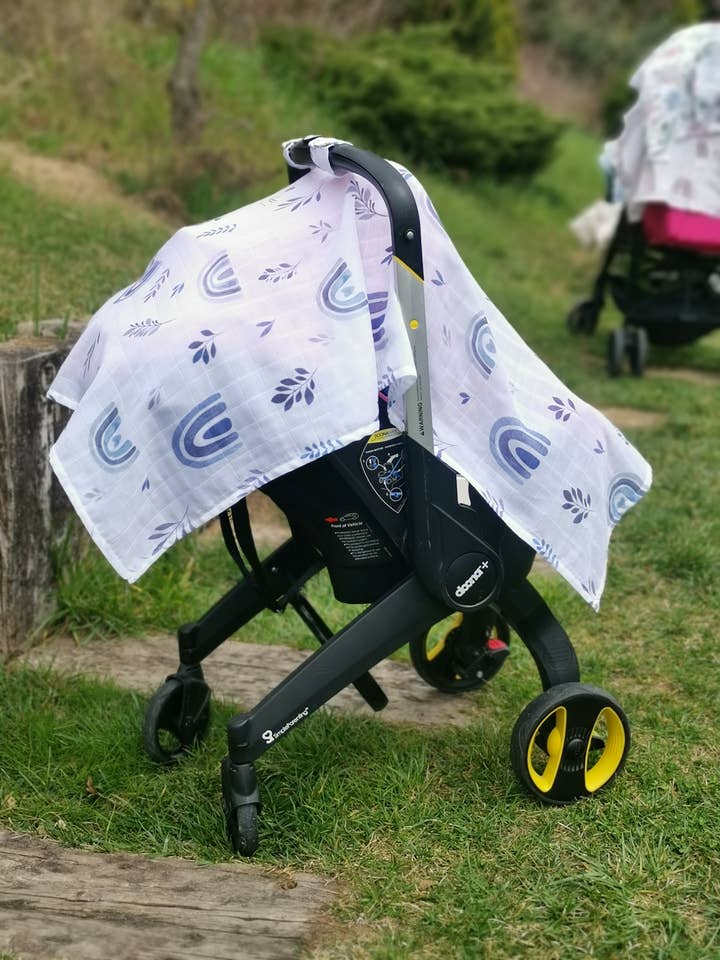 Blue Rainbow Muslin Stroller Cover for wholesale by Baby Laurel Organics