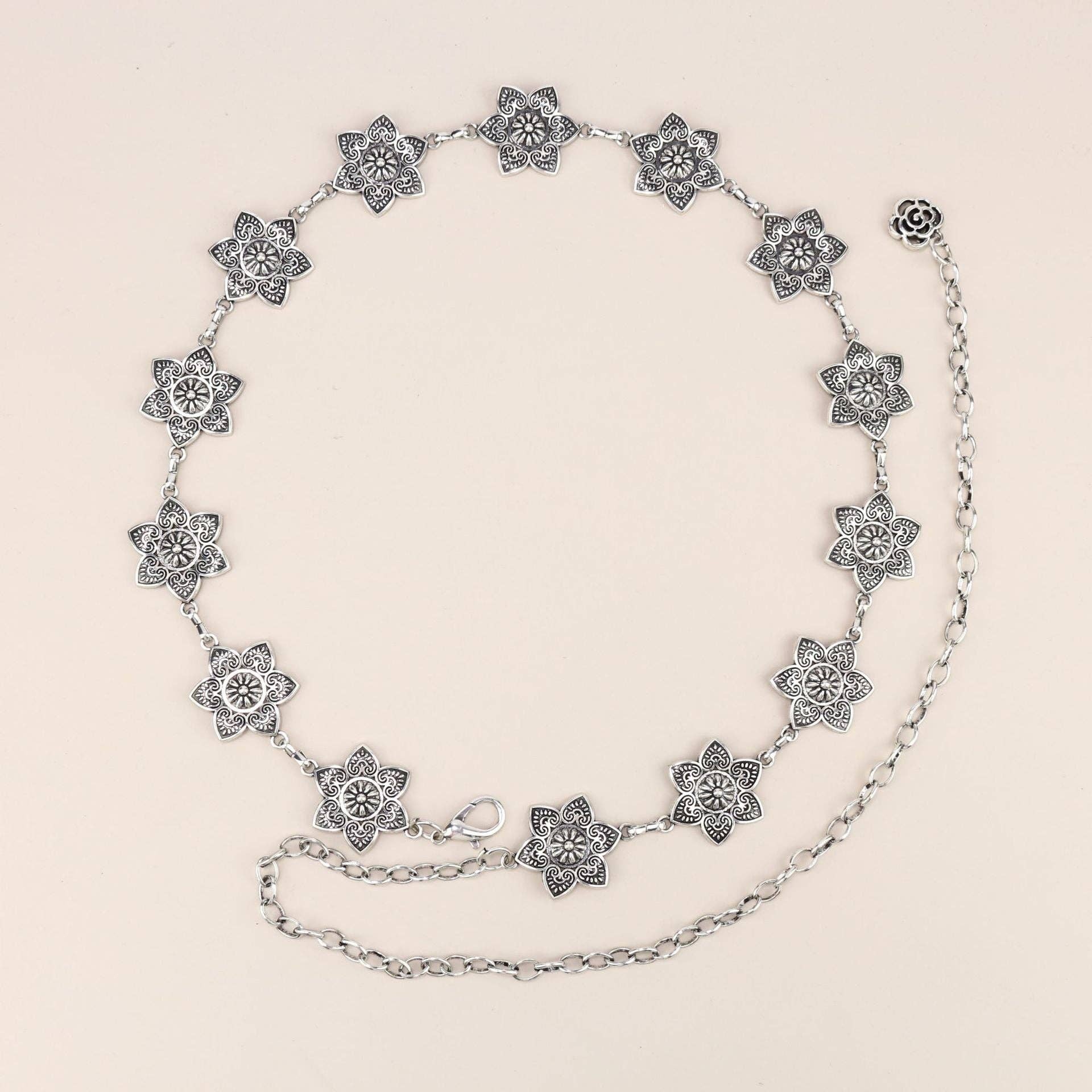 SALINA TRADING INC – Großhandel Gürtel – Damen – Metallkettengürtel mit Schmetterlings- und Herzdesign26